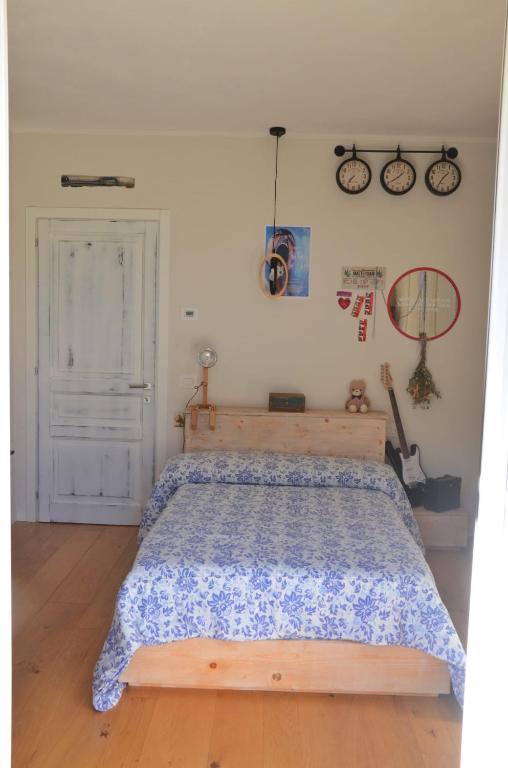 Postel nebo postele na pokoji v ubytování Pane e Marmellata