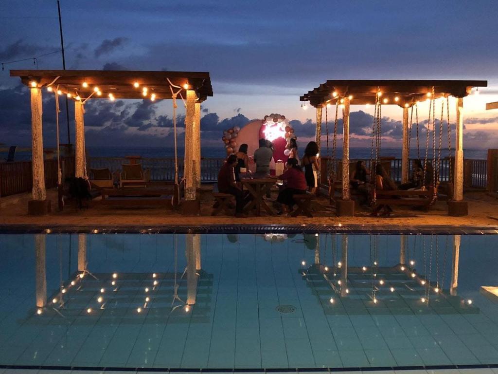 Bazén v ubytování Rock Fort Beach Resort nebo v jeho okolí