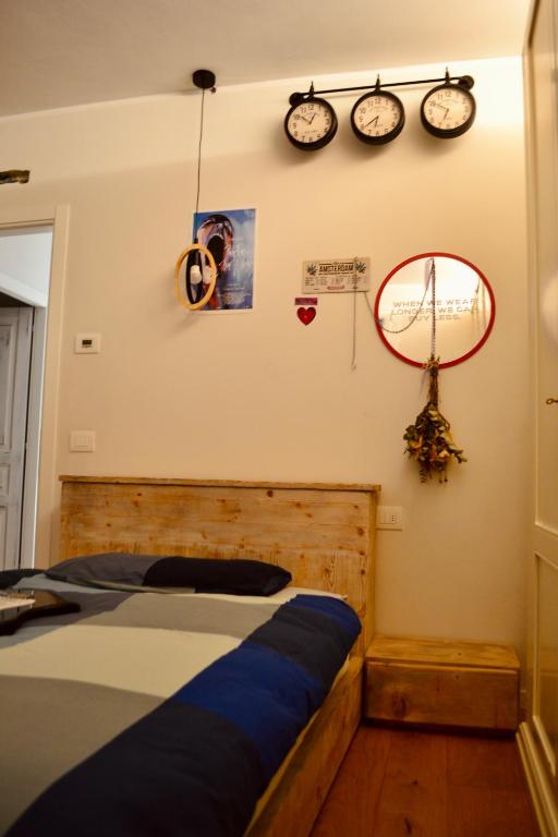 Postel nebo postele na pokoji v ubytování Pane e Marmellata