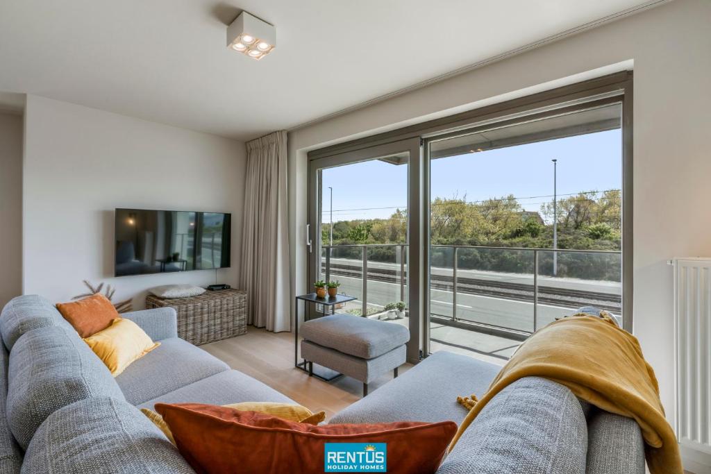Posezení v ubytování Sealine - modern apartment at 100m from the beach