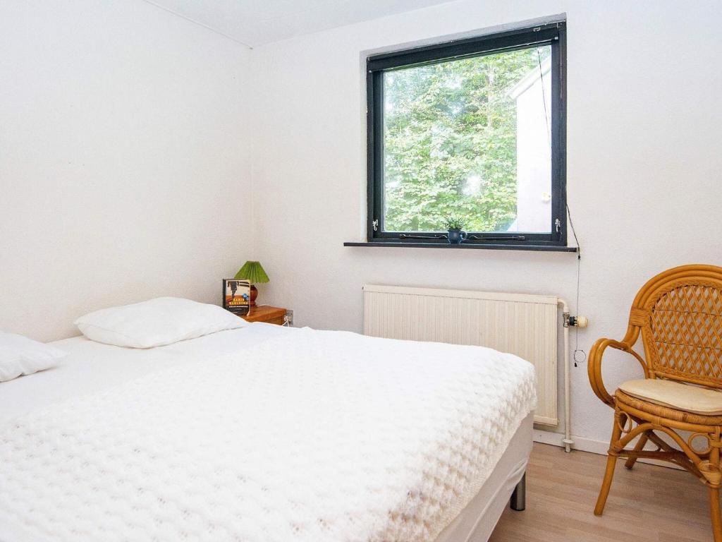 Postel nebo postele na pokoji v ubytování 8 person holiday home in Struer-By Traum
