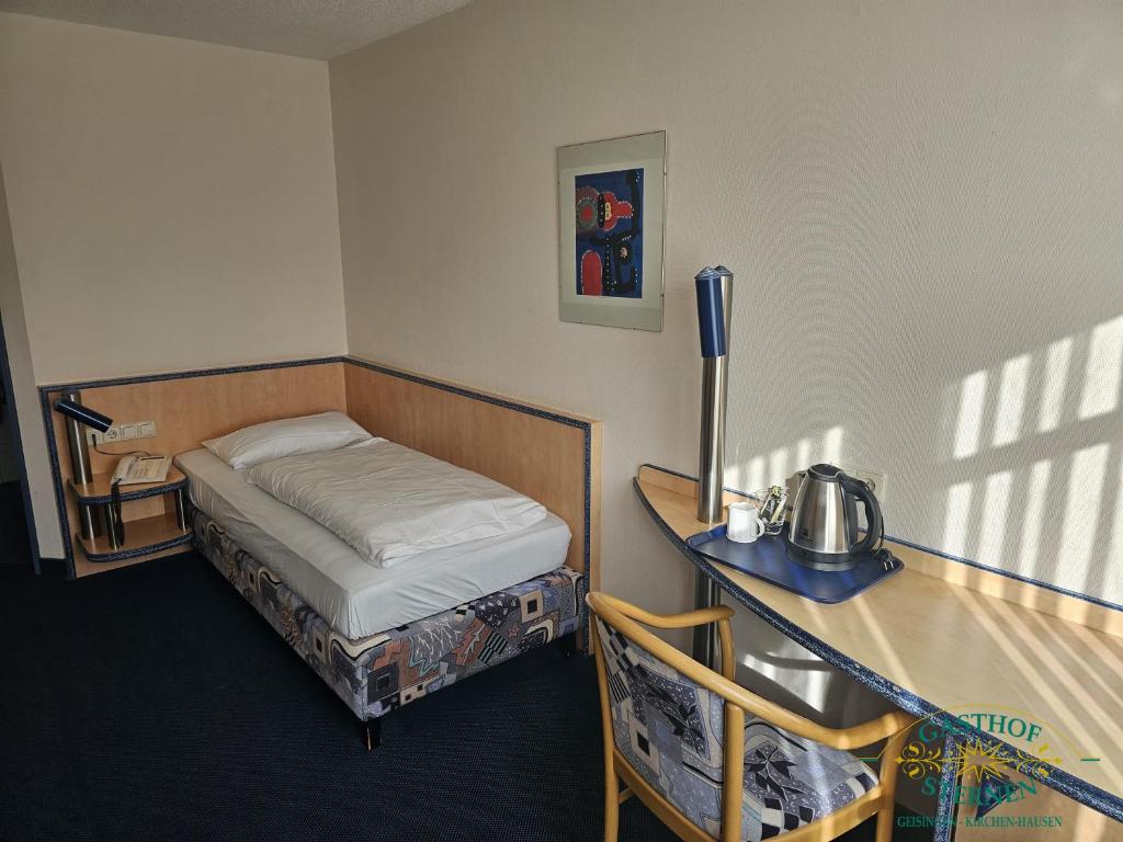 Postel nebo postele na pokoji v ubytování Hotel Gasthof Sternen