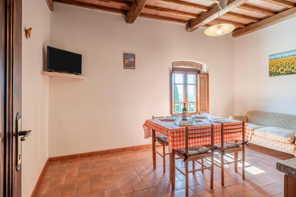 TV a/nebo společenská místnost v ubytování Agriturismo Fadanelli - Le Rondini