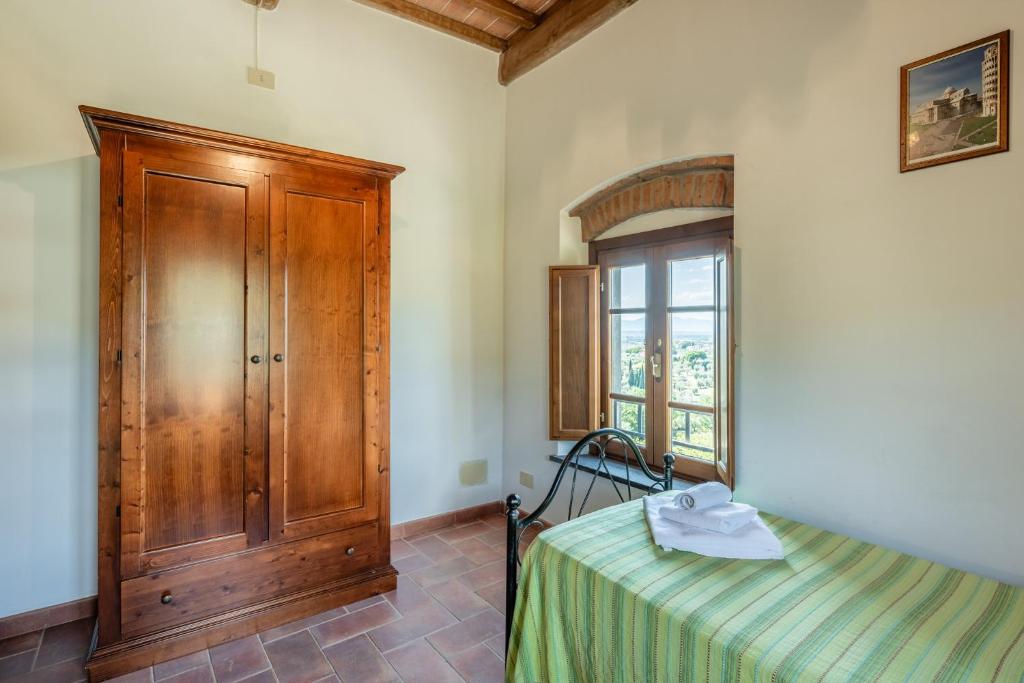 Postel nebo postele na pokoji v ubytování Agriturismo Fadanelli - Le Rondini