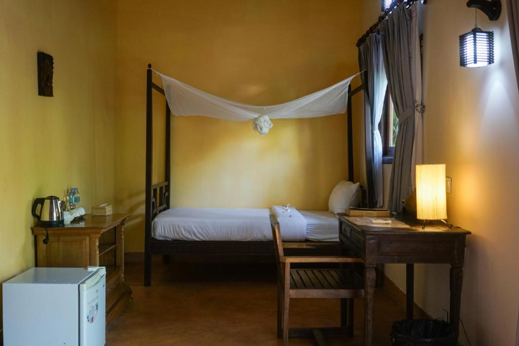 Postel nebo postele na pokoji v ubytování Mealea Resort
