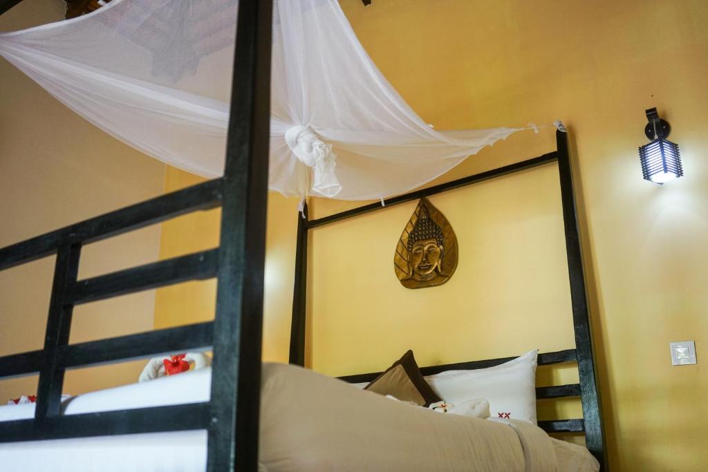 Postel nebo postele na pokoji v ubytování Mealea Resort