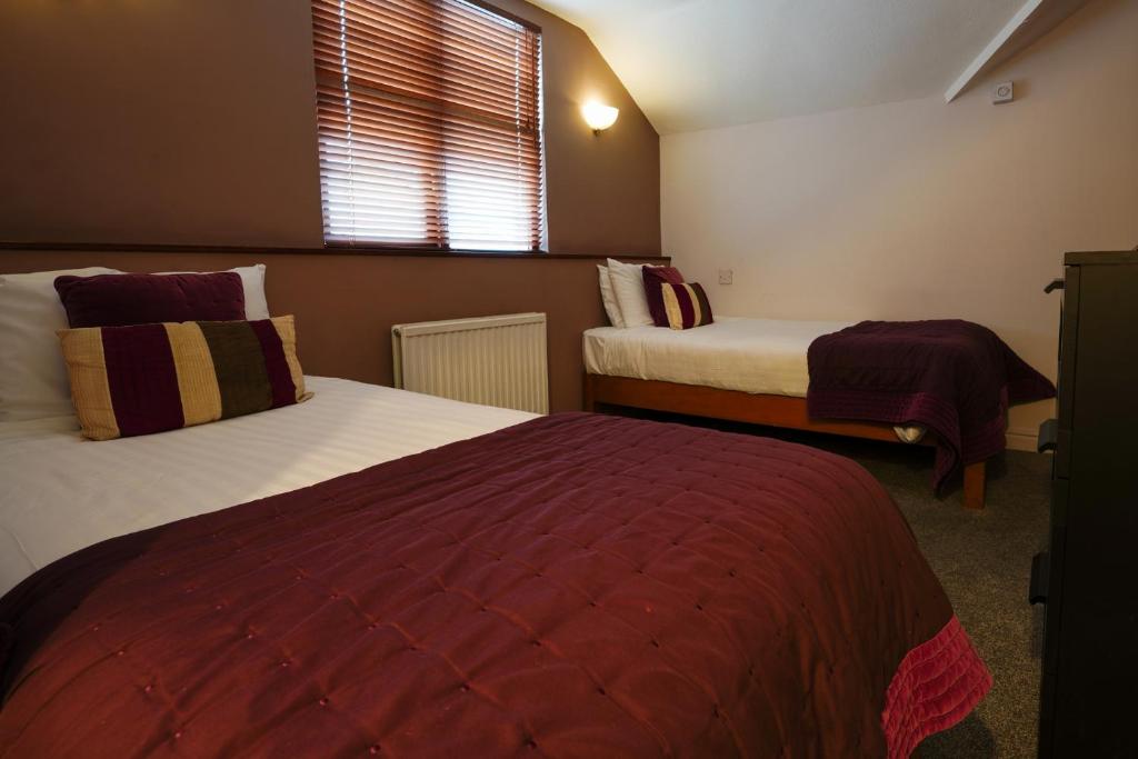 Postel nebo postele na pokoji v ubytování Gomersal Park Hotel & Dream Spa