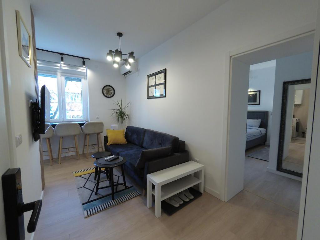 TV a/nebo společenská místnost v ubytování Aster Apartmani