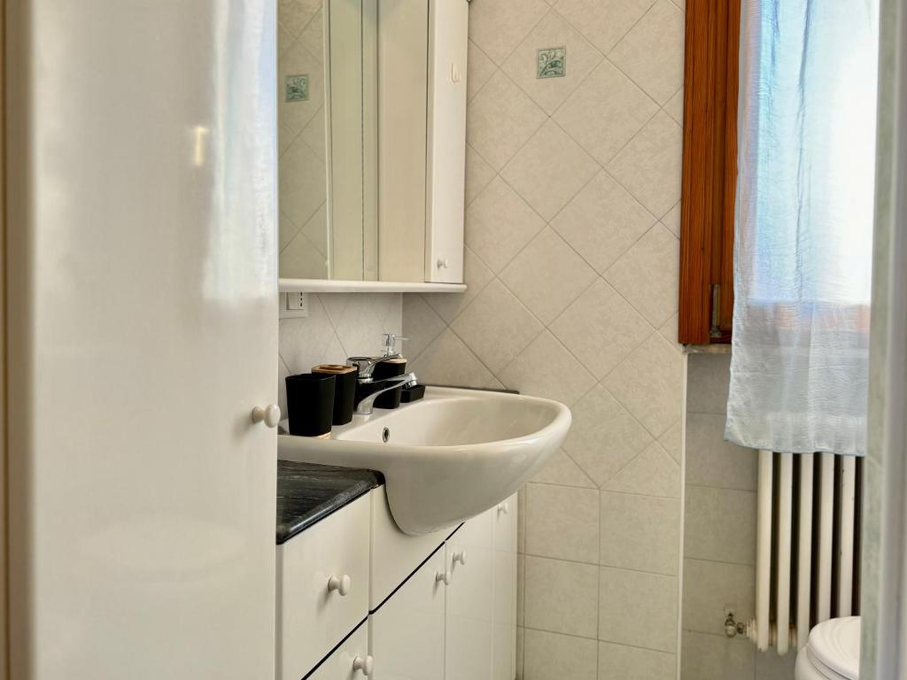 Koupelna v ubytování 82, Attico Leonardo