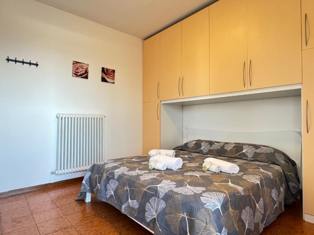 Postel nebo postele na pokoji v ubytování 82, Attico Leonardo