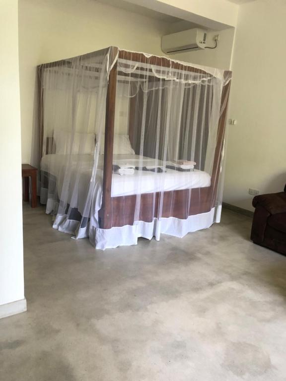 Postel nebo postele na pokoji v ubytování Hotel Paradiso,