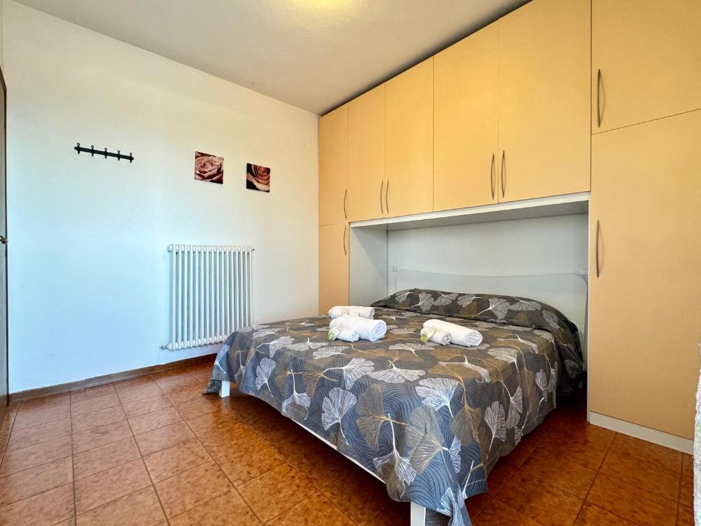 Postel nebo postele na pokoji v ubytování 82, Attico Leonardo