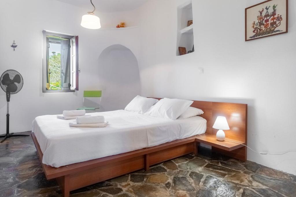 Posteľ alebo postele v izbe v ubytovaní Aegean Cottage