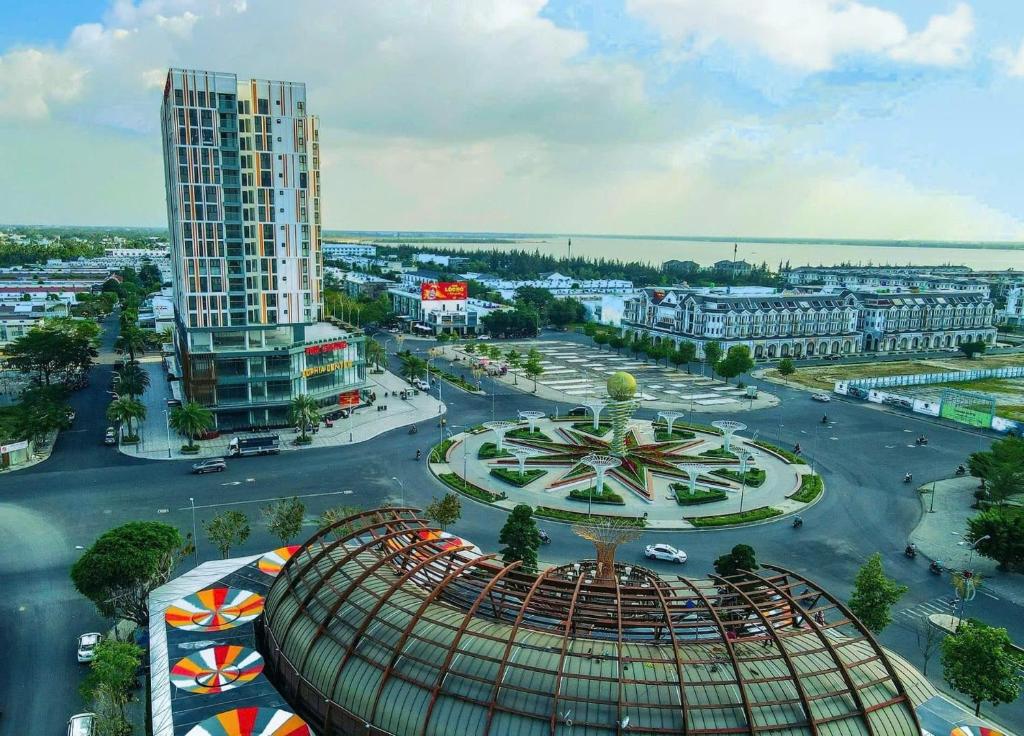 an aerial view of a city with a roller coaster at Căn Hộ Cao Cấp 3 phòng ngủ Sophia Rạch Giá in Rach Gia