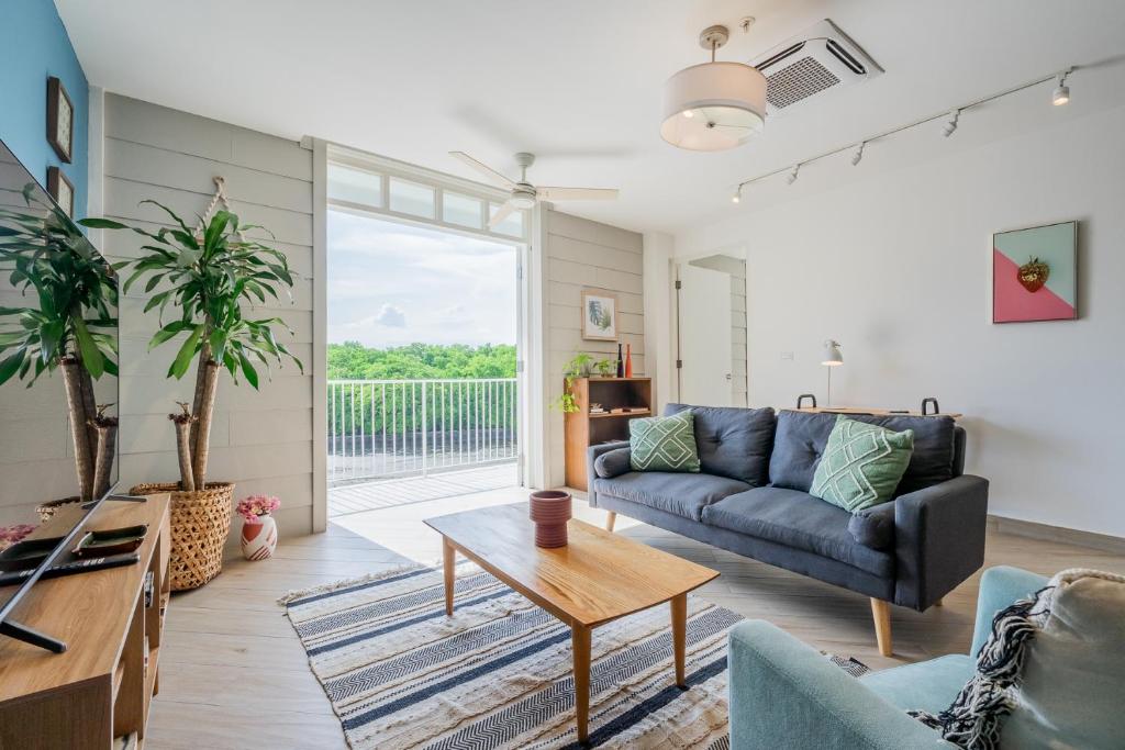 Zona de estar de Casa La Costa By Wynwood House