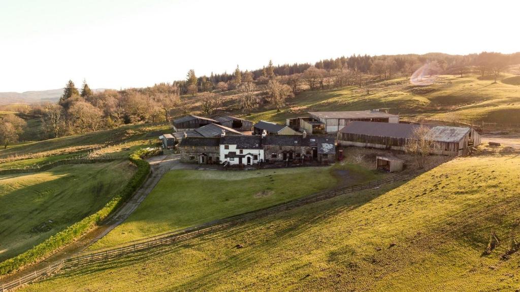 an aerial view of a house on a hill at Sunny Brow Cottage at Thompson Ground in Hawkshead