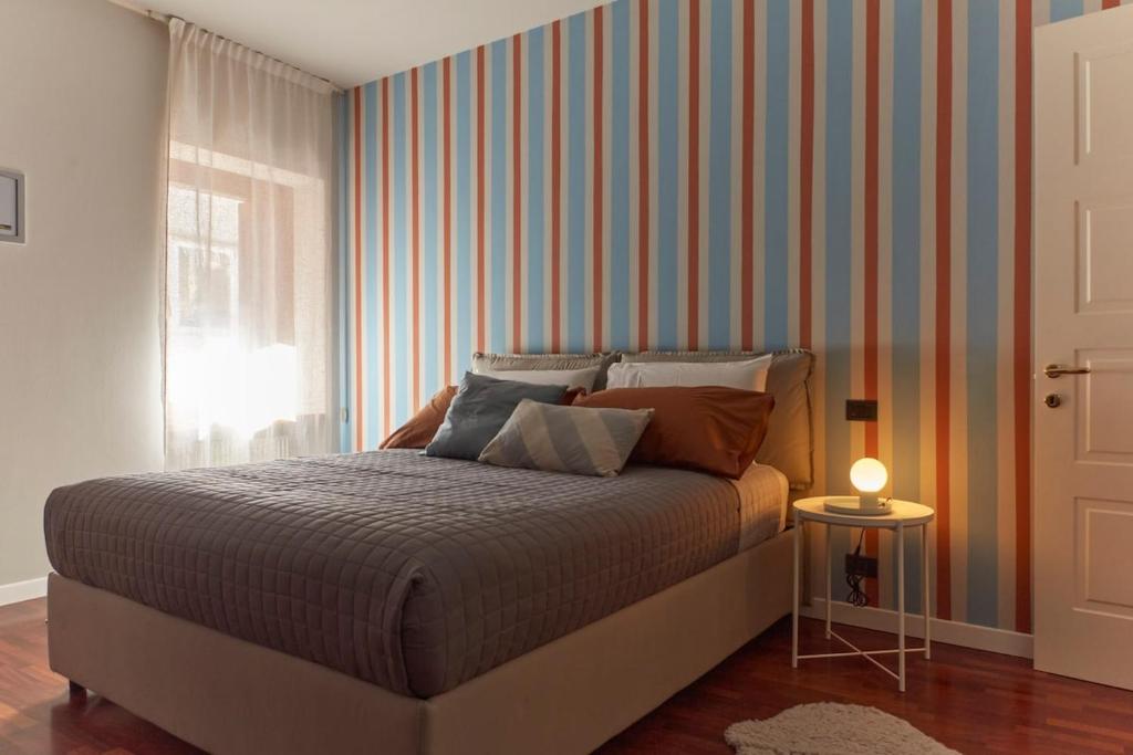 En eller flere senge i et værelse på Fior di Pesco Central Retreat