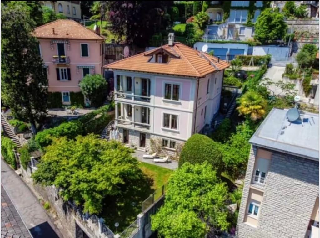 an aerial view of a house with a roof at Luxury Villa Como Lake View Private in Como