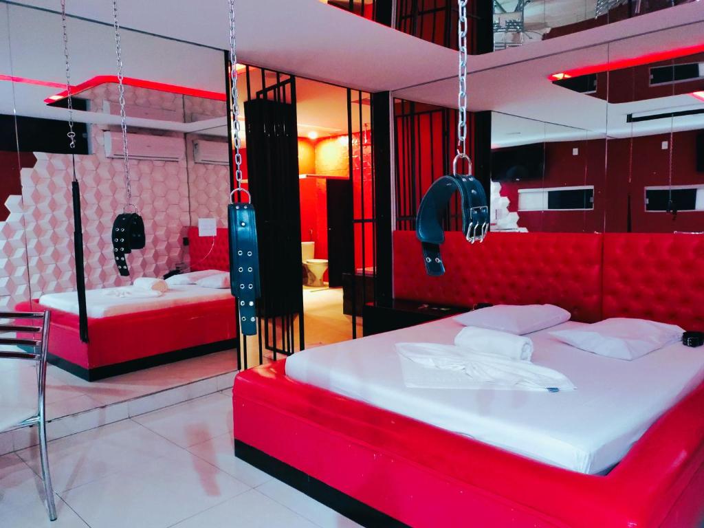 Postel nebo postele na pokoji v ubytování CAPRI Motel