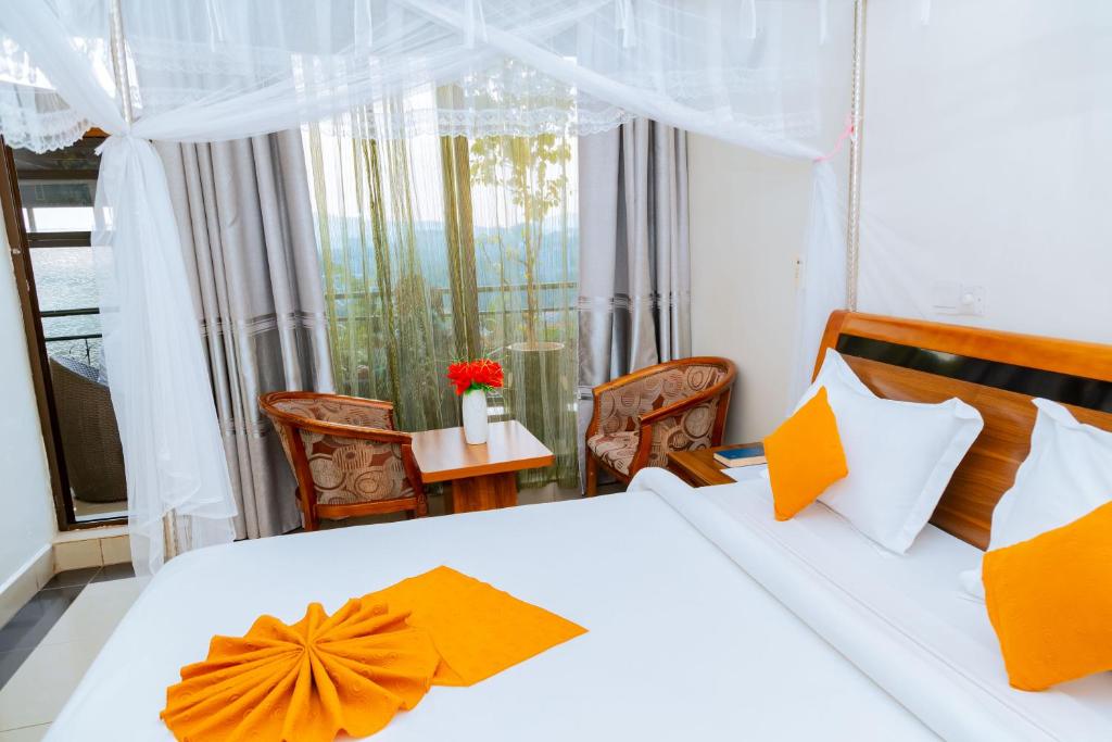 Postel nebo postele na pokoji v ubytování Five to Five Hotel