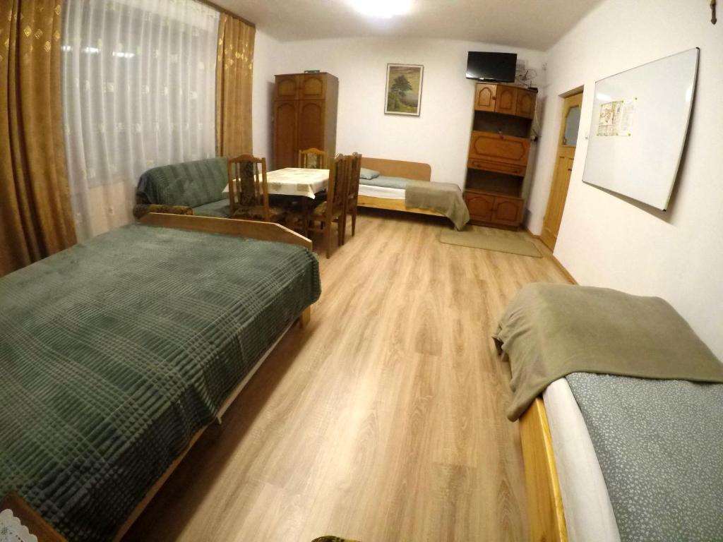 Posteľ alebo postele v izbe v ubytovaní Pokoje gościnne, mieszkanie na wynajem w Świdniku k Lublina