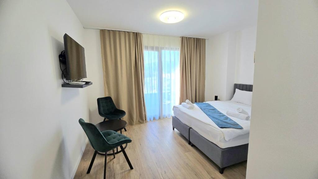 Postel nebo postele na pokoji v ubytování Hotel MM Residence