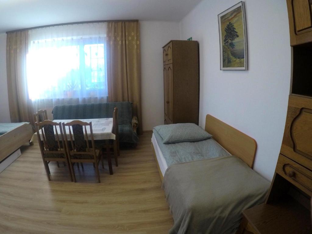 Posteľ alebo postele v izbe v ubytovaní Pokoje gościnne, mieszkanie na wynajem w Świdniku k Lublina
