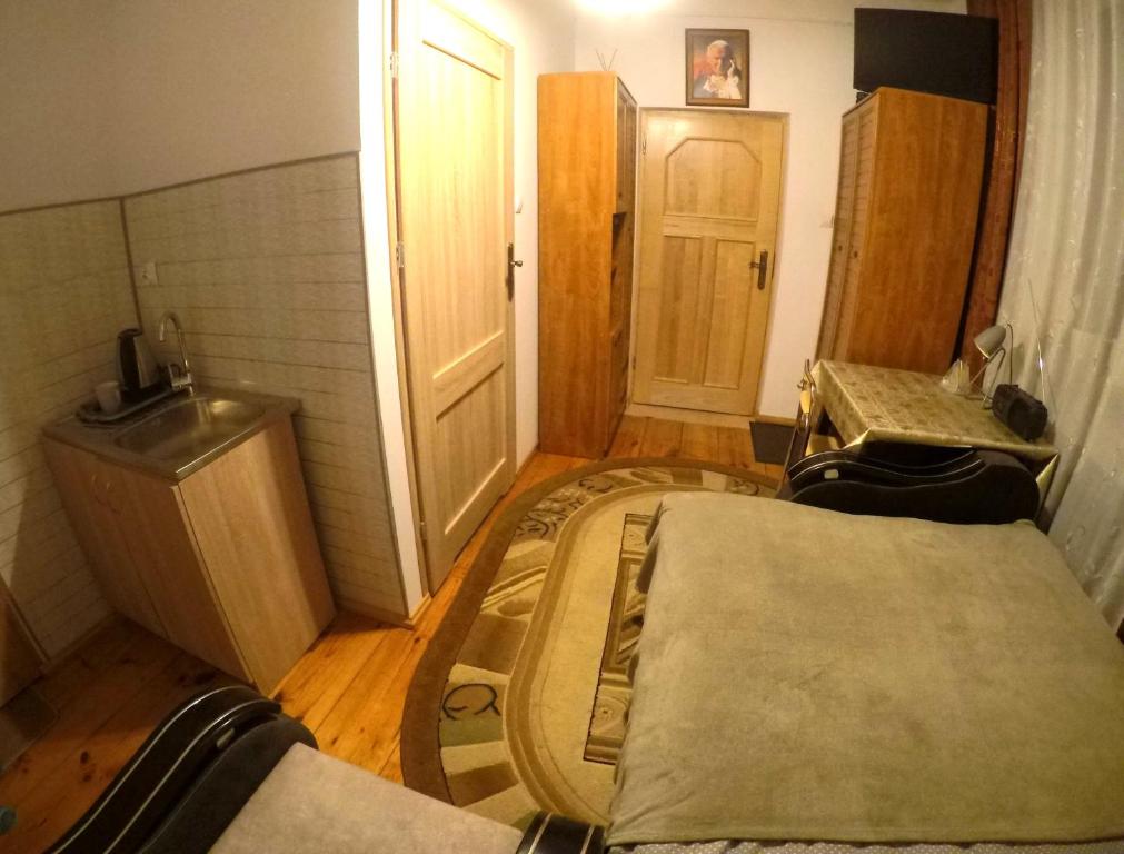 Posteľ alebo postele v izbe v ubytovaní Pokoje gościnne, mieszkanie na wynajem w Świdniku k Lublina