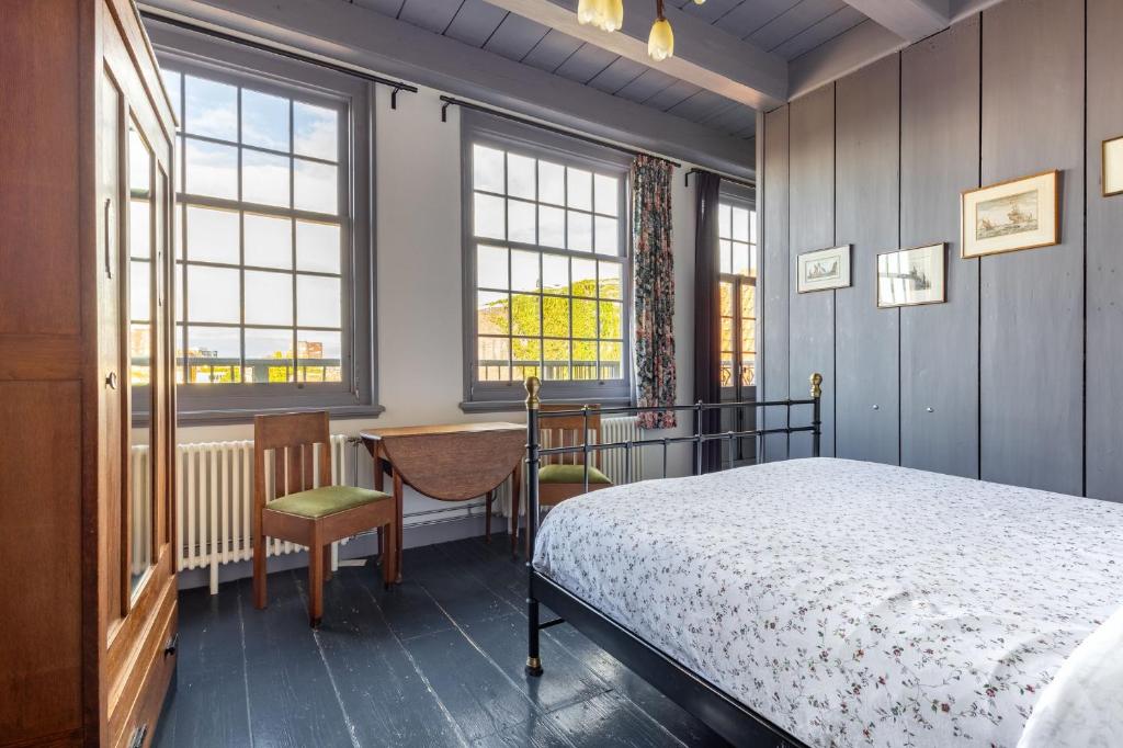 Postel nebo postele na pokoji v ubytování B&B In de Prinsenstraat