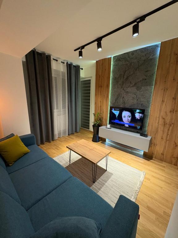 TV a/nebo společenská místnost v ubytování Apartment N02