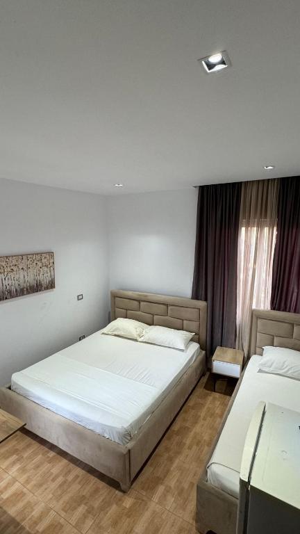 Postel nebo postele na pokoji v ubytování GuestHouse Cami