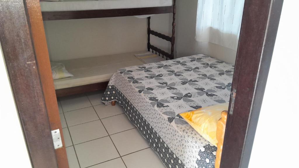 Postel nebo postele na pokoji v ubytování Pousada CRUZ SAO FRANCISCO DO SUL