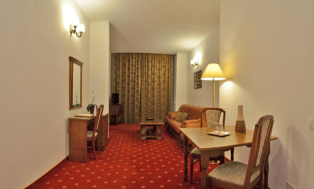 Posezení v ubytování Hotel Emma West