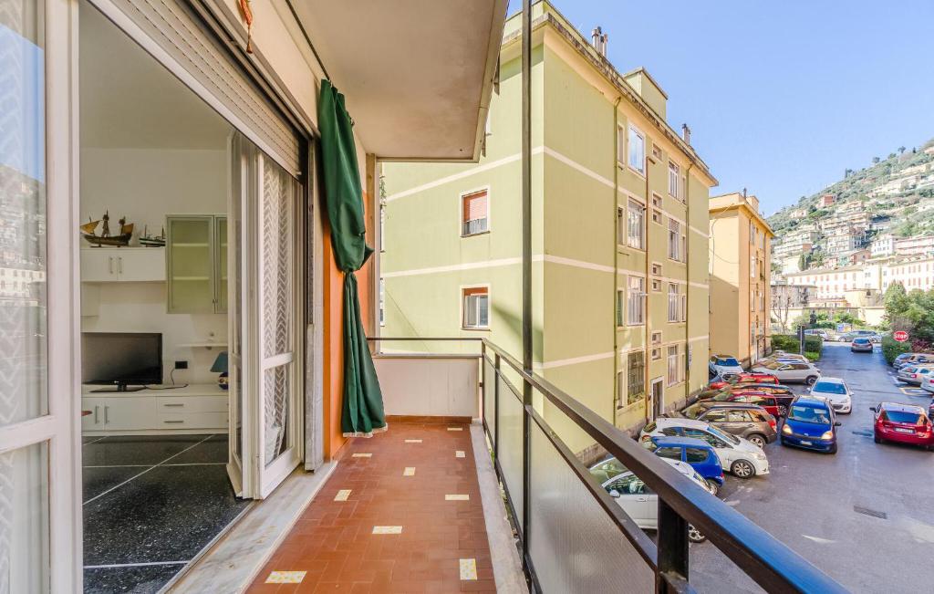 a balcony with a view of a street with cars at 1 Bedroom Beautiful Apartment In Recco in Recco
