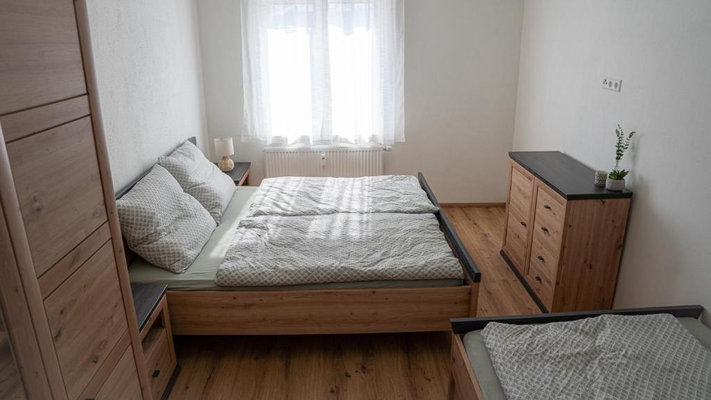 Postel nebo postele na pokoji v ubytování Tom s Apartment