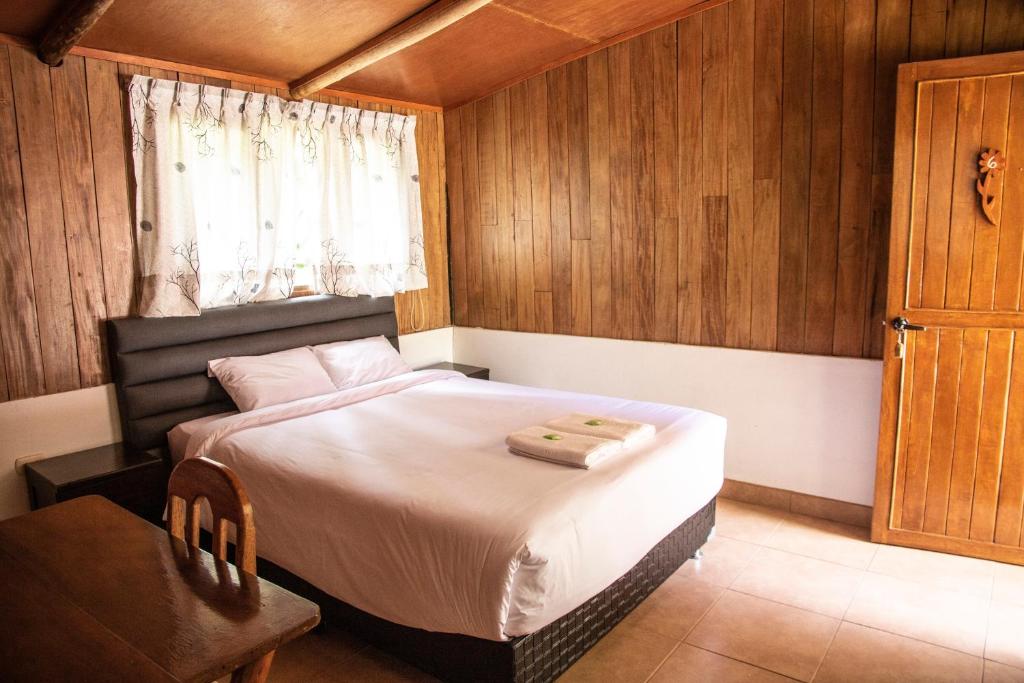 Postel nebo postele na pokoji v ubytování Mandor Machu Picchu
