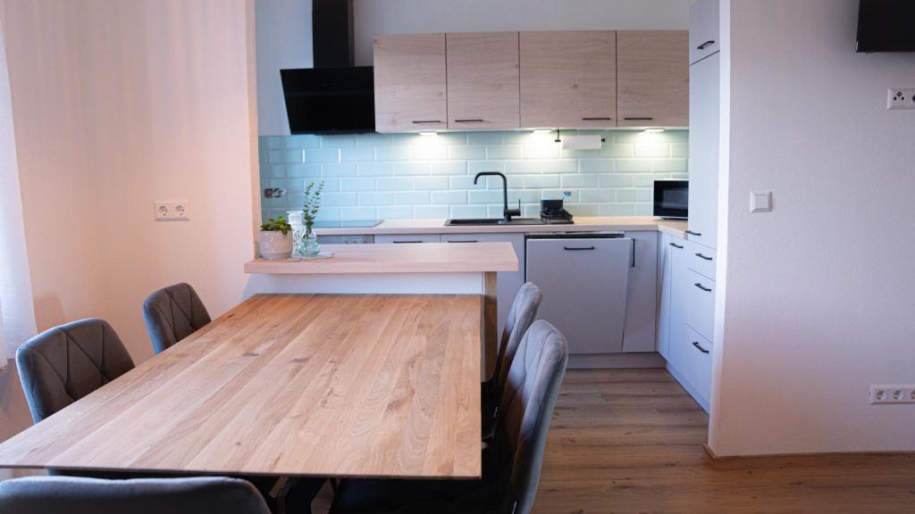 Kuchyň nebo kuchyňský kout v ubytování Tom s Apartment