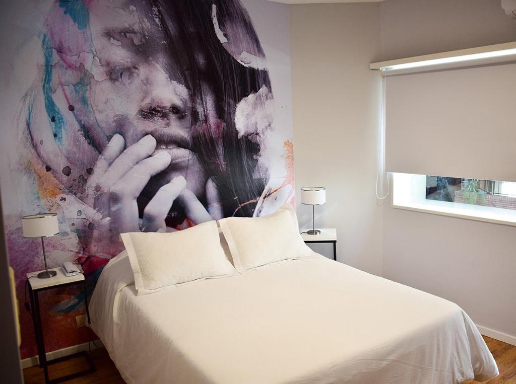Una cama o camas en una habitación de Alquileres Temporarios by CLH Rentals