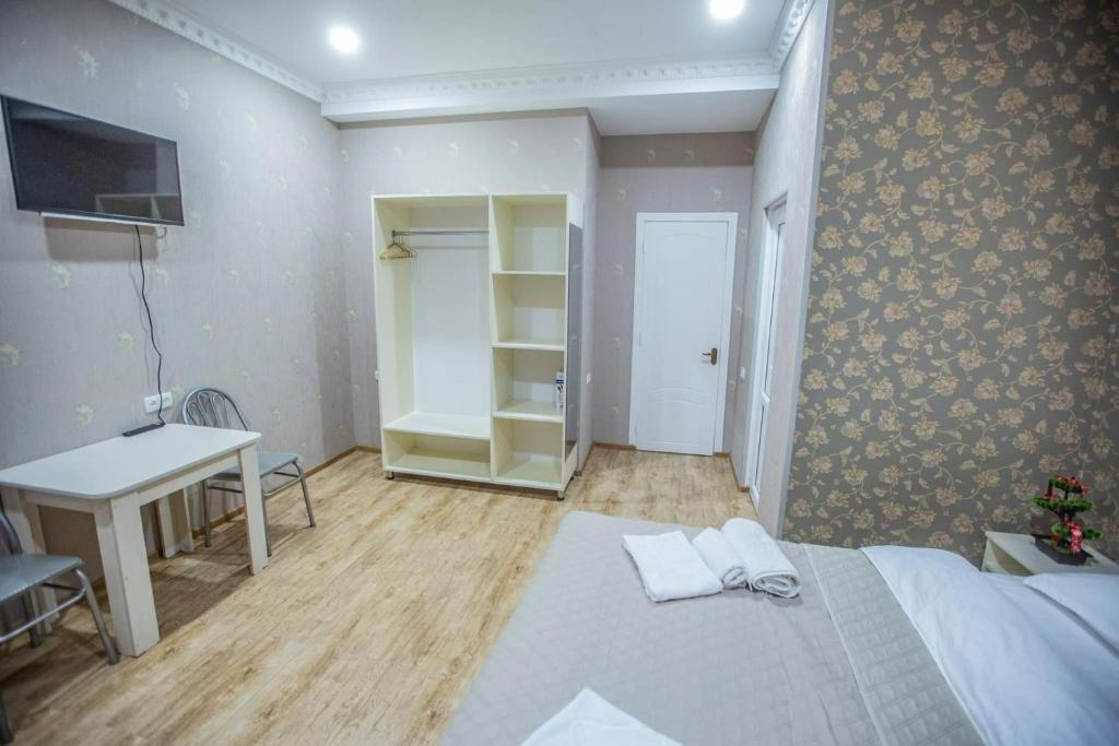 TV a/nebo společenská místnost v ubytování Tbilisi Town