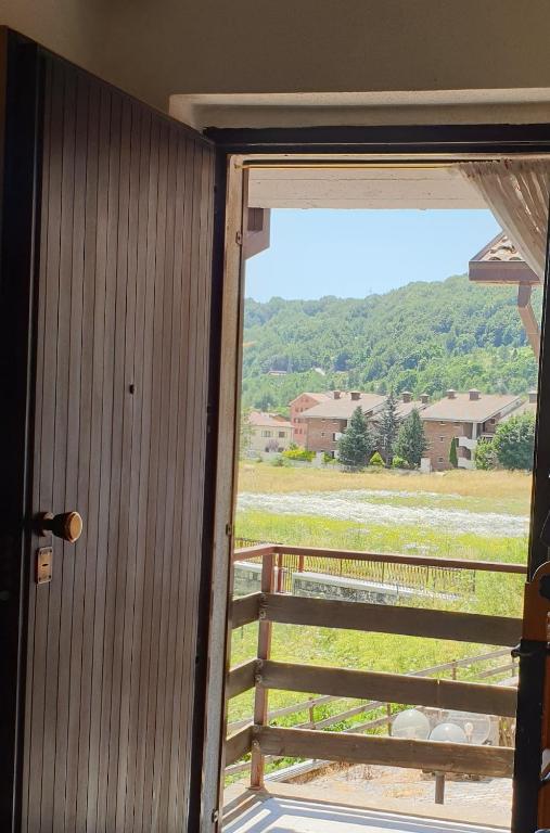 a view of a field from a window at Vacanze a Rovere in Rovere