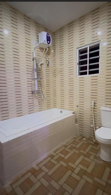 Koupelna v ubytování Sea-Love Apartment In Ado-Ekiti