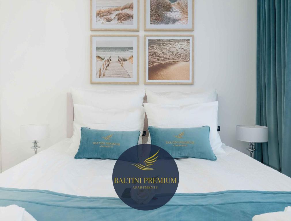 Postel nebo postele na pokoji v ubytování Baltini Premium Apartament Bliżej Morza