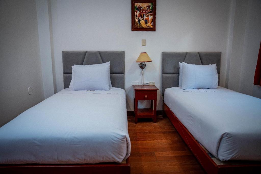 Postel nebo postele na pokoji v ubytování Valle Mistico Hotel Boutique