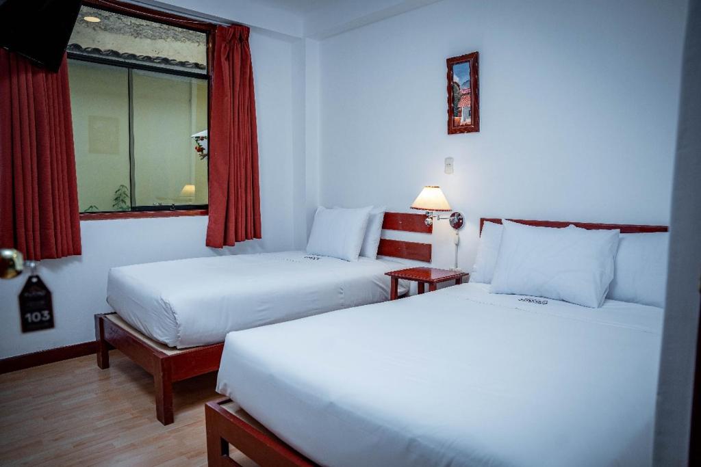 Postel nebo postele na pokoji v ubytování Valle Mistico Hotel Boutique