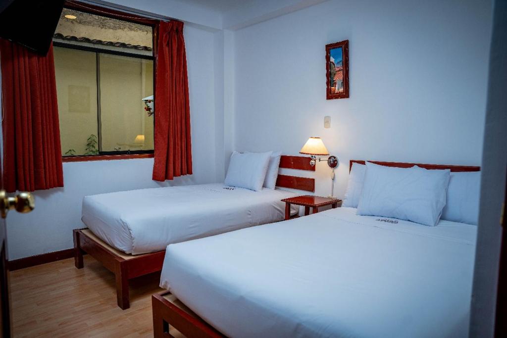 Postel nebo postele na pokoji v ubytování Valle Mistico Hotel Boutique