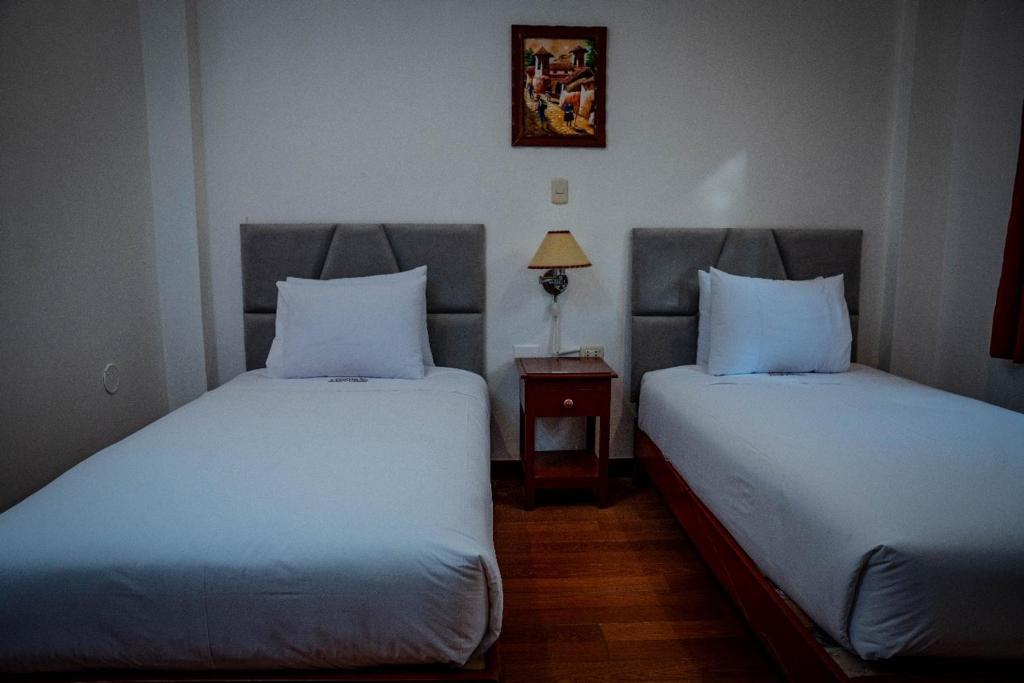 Postel nebo postele na pokoji v ubytování Valle Mistico Hotel Boutique