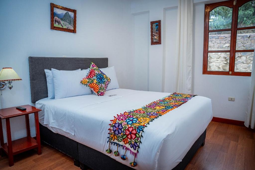 Postel nebo postele na pokoji v ubytování Valle Mistico Hotel Boutique