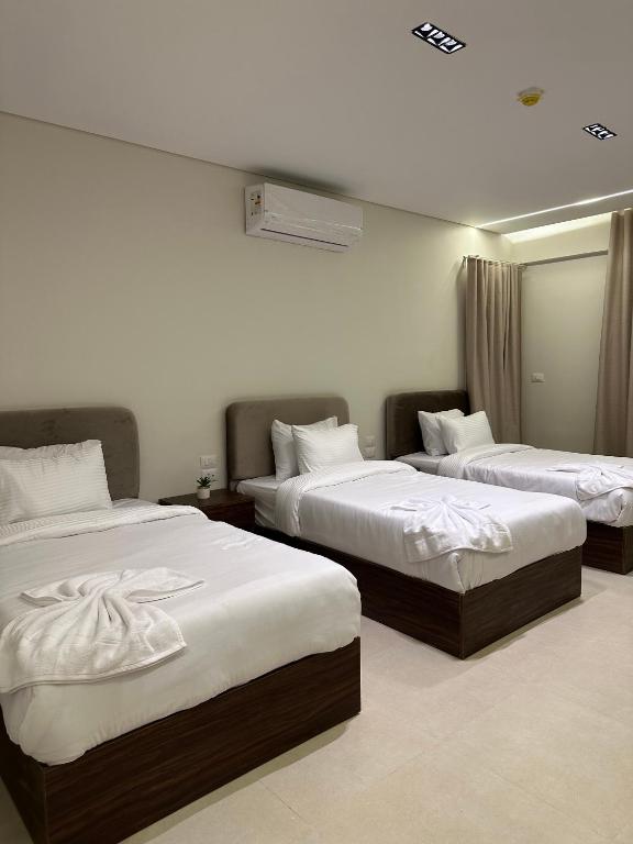 Postel nebo postele na pokoji v ubytování Imperial Hotel
