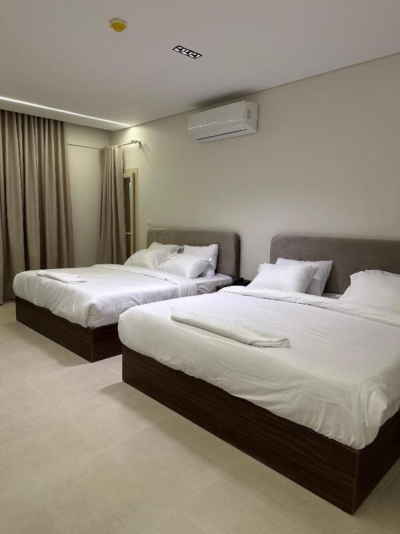 Postel nebo postele na pokoji v ubytování Imperial Hotel