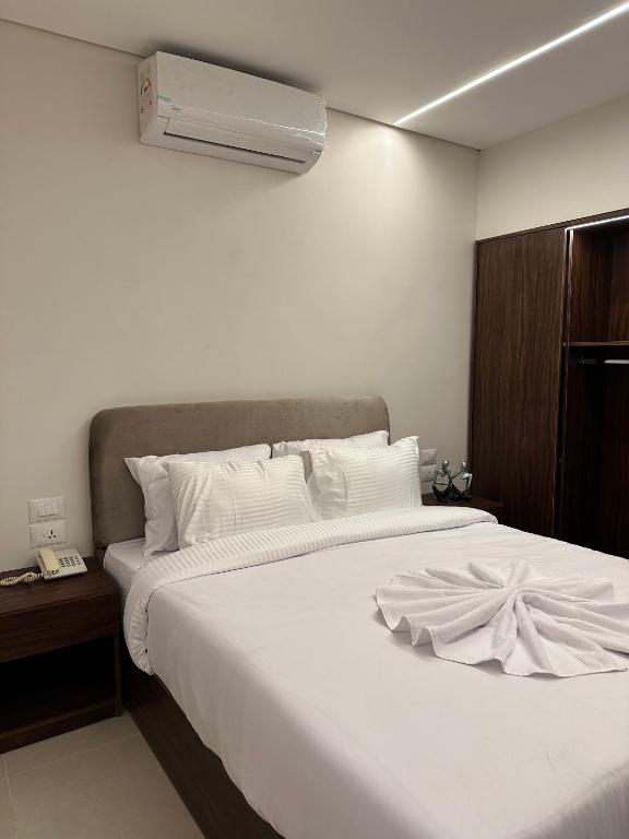 Postel nebo postele na pokoji v ubytování Imperial Hotel